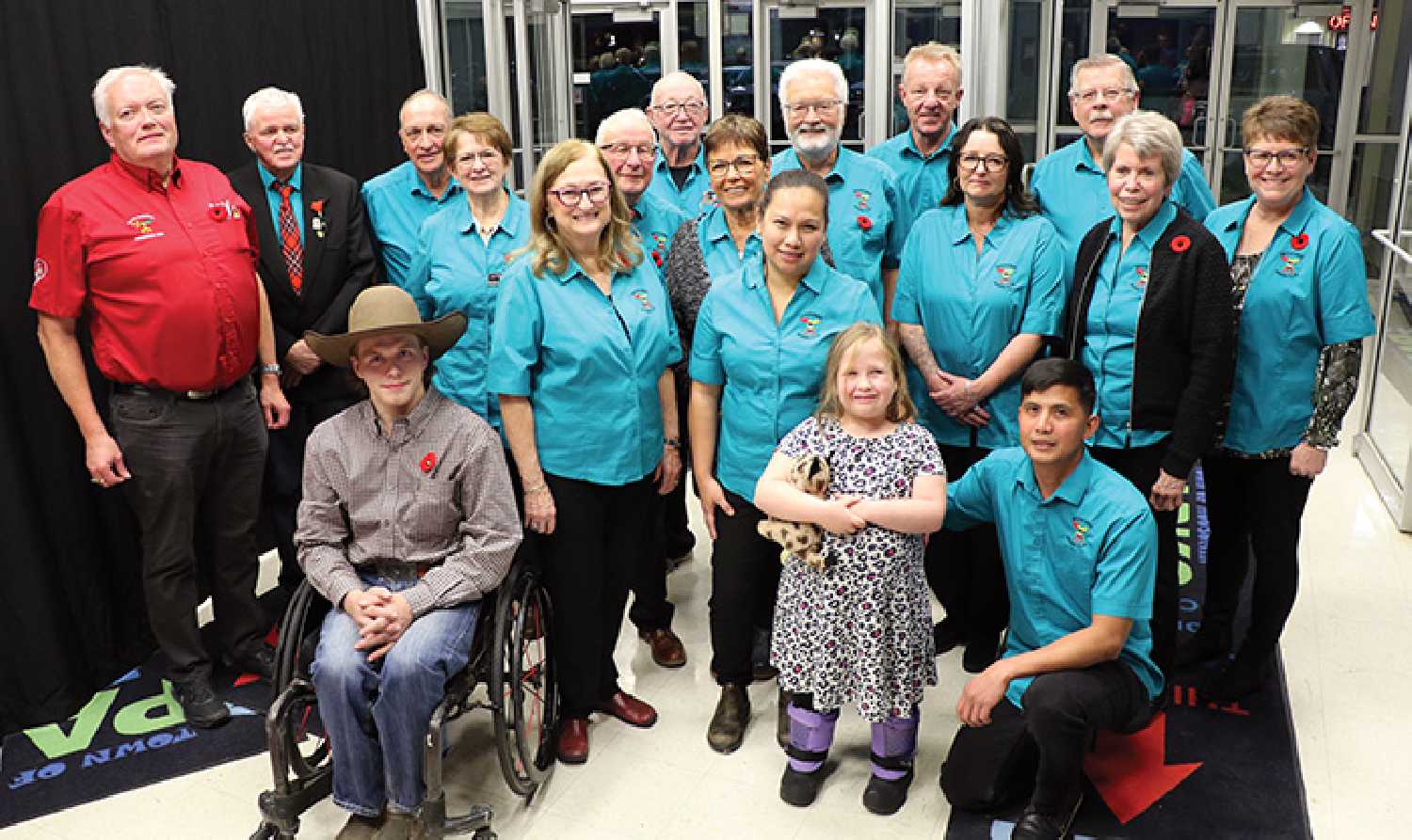 The Moosomin Shrine Club members with some of the Shrine Hospital patients they have helped over the years.